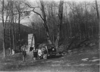 Frank Page and Ruth Thayer with children Edward and Page, next to car on a trip