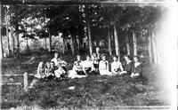 Group portrait at the edge of the woods