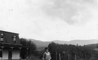 Woman and mountainous landscape