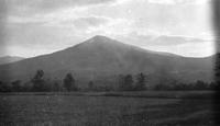 Clouds, mountain, and field