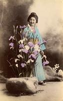 Woman admiring flowers