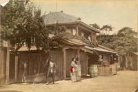 Employees outside a tea house