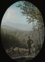 Congdon looking out at Camel's Hump and Bolton Valley from Dunsmoor Lodge