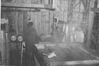 Men washing collection buckets